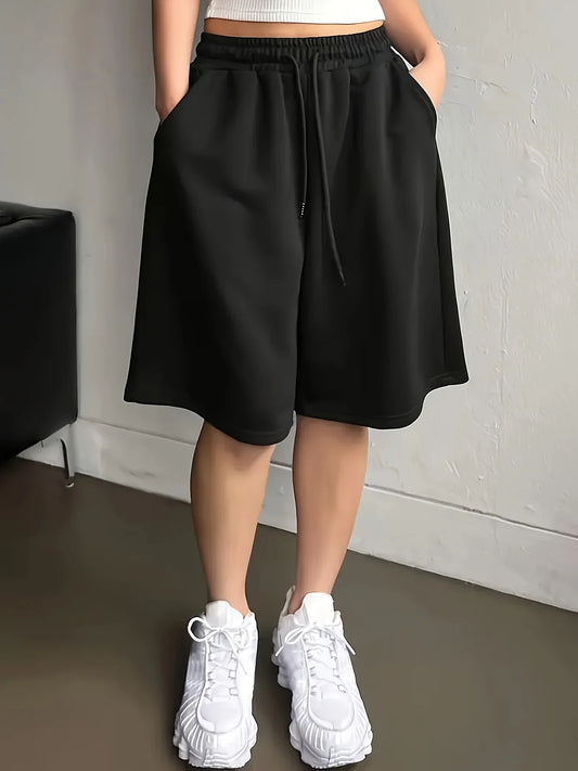 Plus-size women's casual style solid color sweatshirt and shorts with drawstring waist and pockets for everyday casual wear.