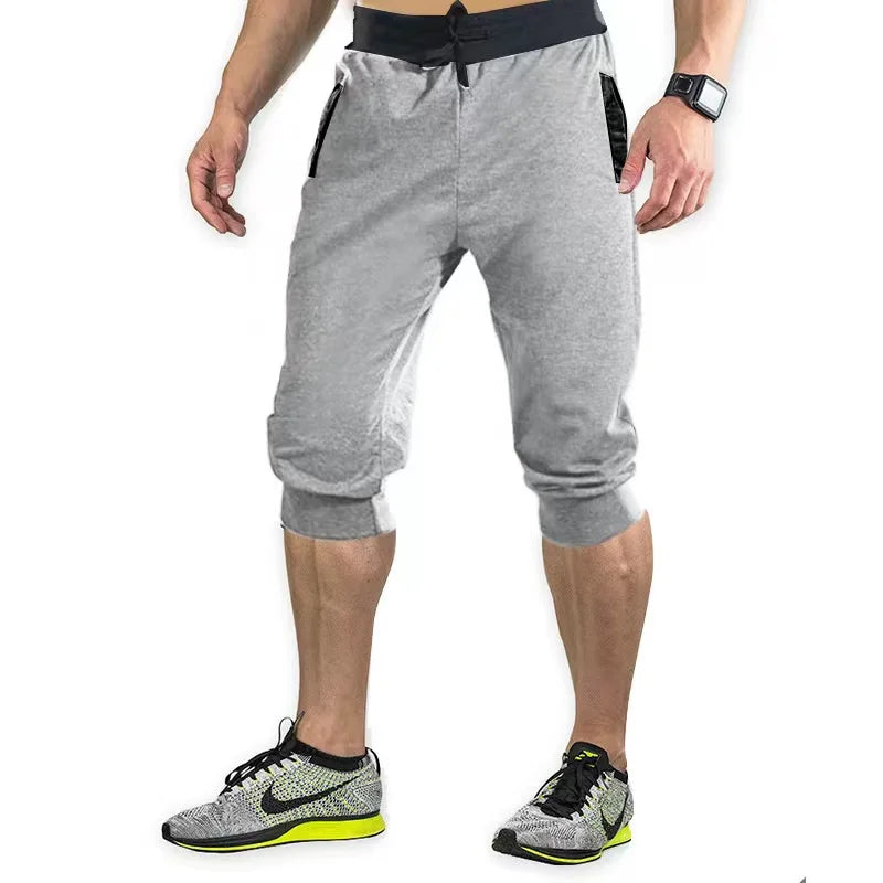 2025 new men's sports pants men's casual jogging shorts elastic fitness pants seven quarter pants casual M-3XL men