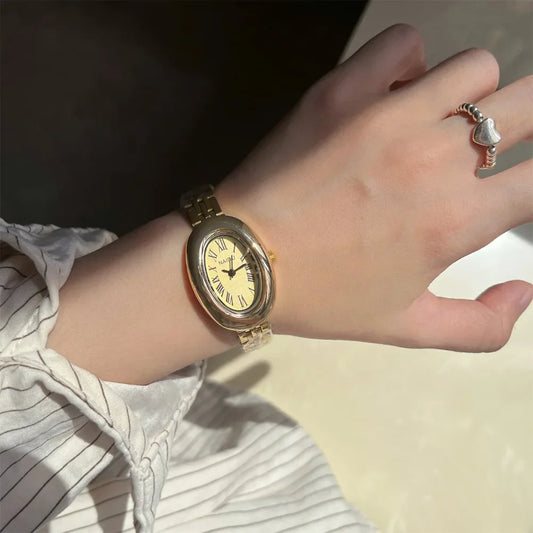 Hot Sale Fashion Watch for Women Mid Ancient Style Oval Dial Small Gold Watch Adjustable Steel Strap Quartz Wristwatch Wholesale