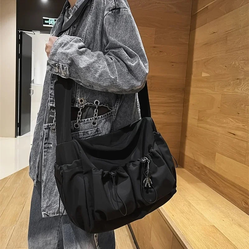 Fashionable Crossbody Bag with Drawstring Accent - Spacious & Secure Zipper Closure