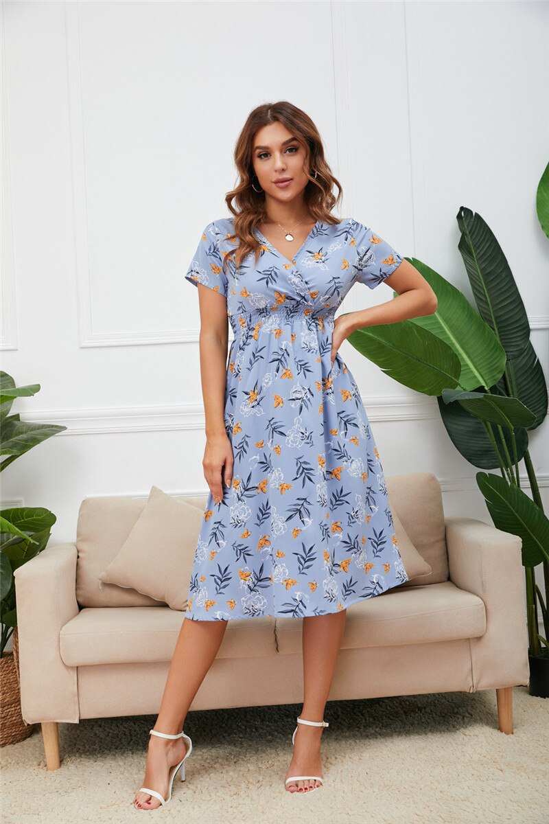 Smocked midi dress with puff sleeves