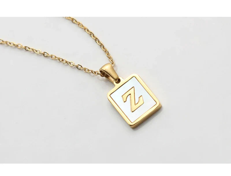 E.B.belle Minimalist Mother of Pearl Shell Stainless Steel Tarnish Free Initial Necklace Gold Plated Letter Necklace for Women
