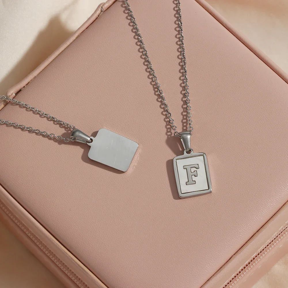 E.B.belle Minimalist Mother of Pearl Shell Stainless Steel Tarnish Free Initial Necklace Gold Plated Letter Necklace for Women