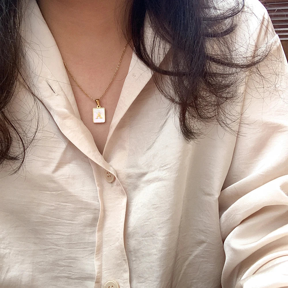 E.B.belle Minimalist Mother of Pearl Shell Stainless Steel Tarnish Free Initial Necklace Gold Plated Letter Necklace for Women