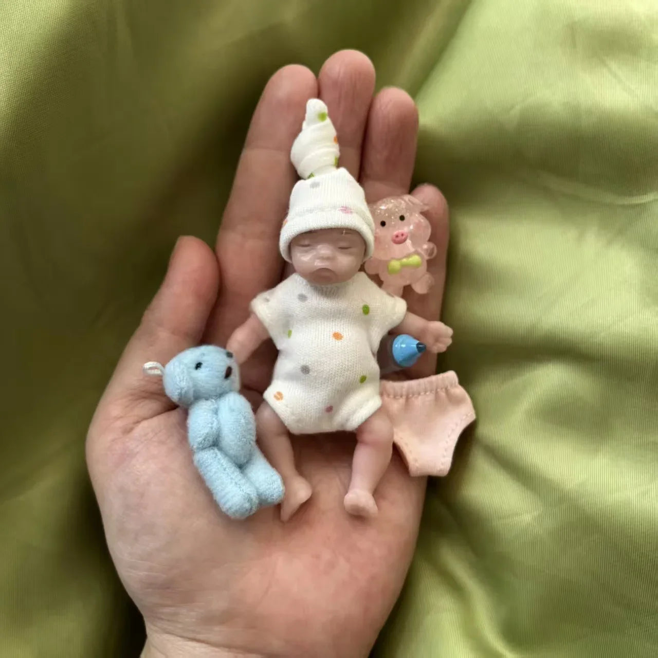 8cm Cute Mini Silicone Bebe Reborn Girl With 2 Sets Mini Outfits for Each Reborn Baby Girl Soft Touching Feeling Flexible Doll