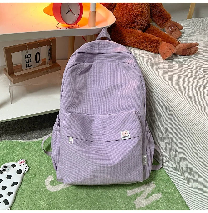Sweet soft girl solid color large capacity student backpack new style for men and women college students simple trendy
