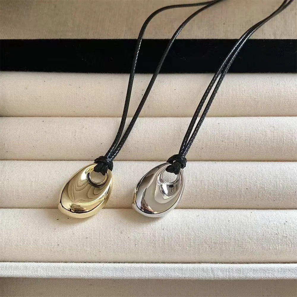 Vintage Irregular Punk Metal Bean Pendant Necklace for Women Adjustable Black Leather Rope Long Clavicle Chain Charm Jewerly