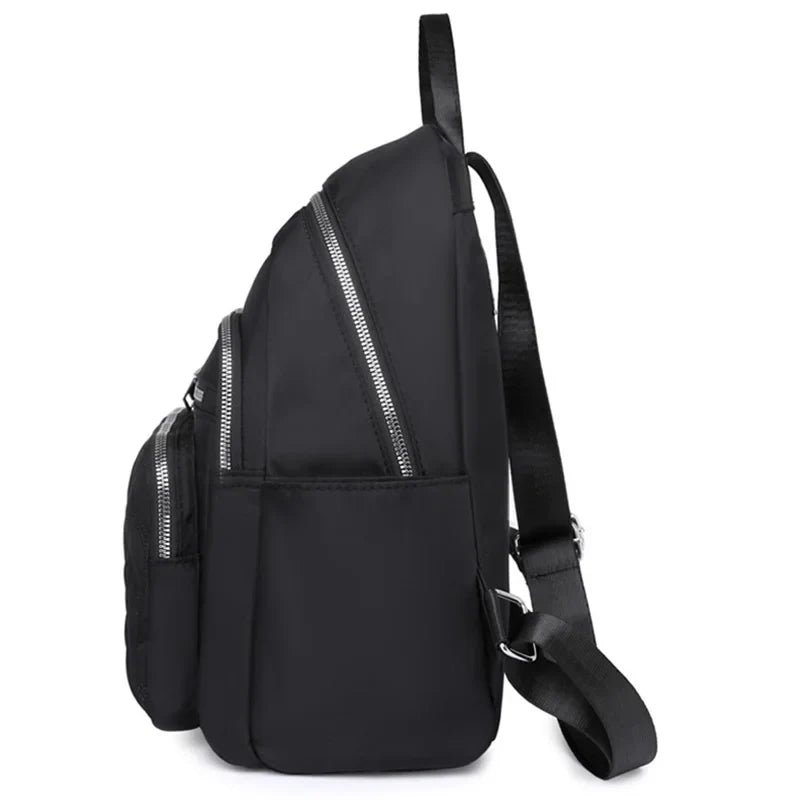 Men's and women's fashionable backpack made of nylon, suitable for travel, tourism and photography. It has multiple pockets.