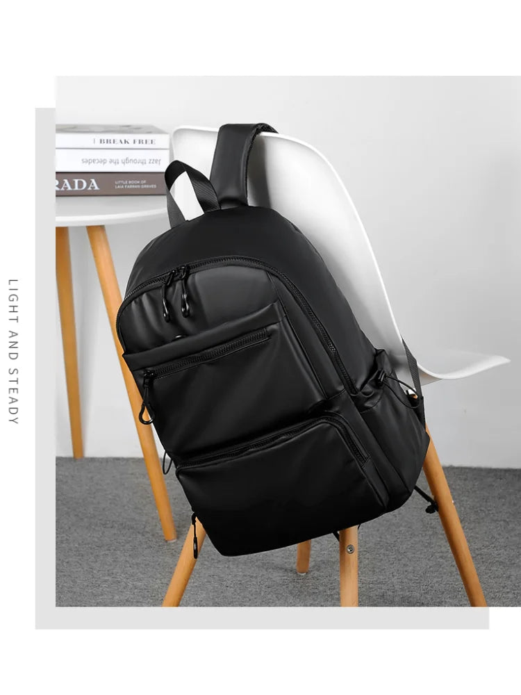1Pcs 14-inch Fashion Casual Backpack, Spacious Laptop Compartment,Waterproof Fabric,Ideal for Men, Students, and Professionals