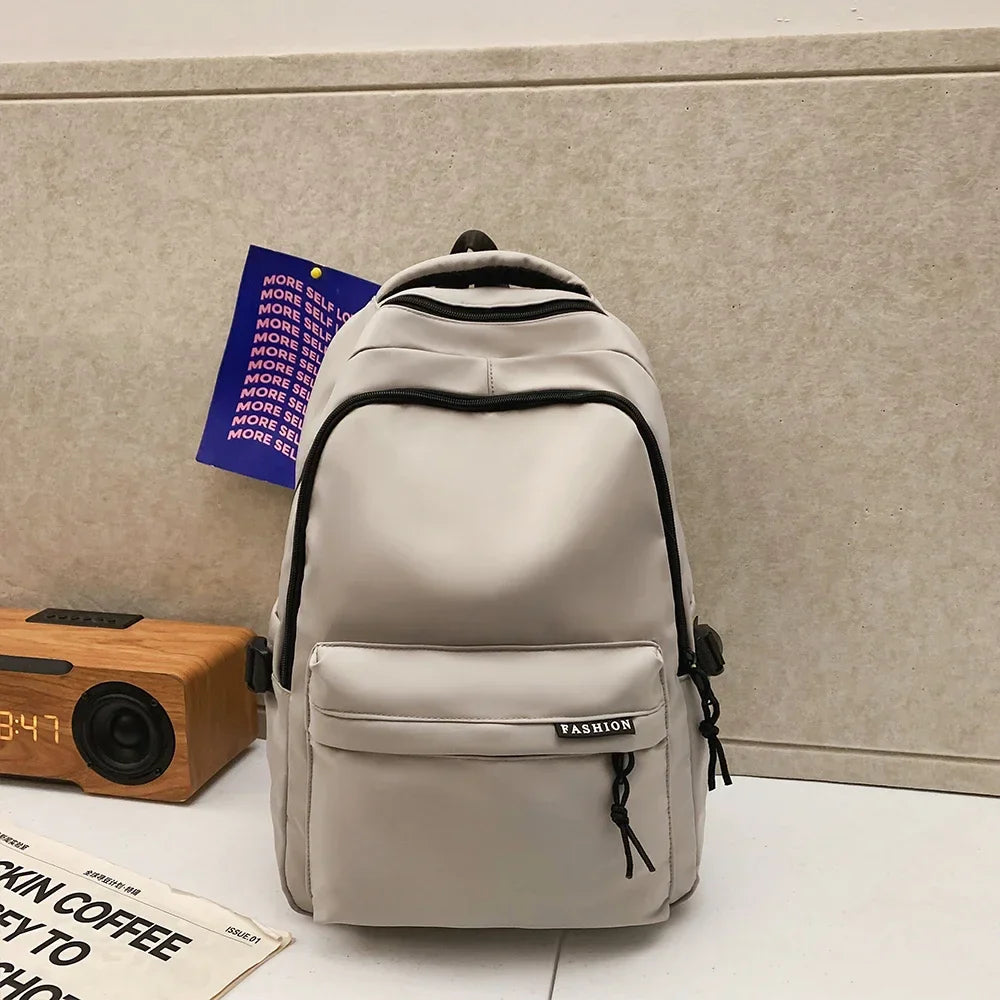 Large Capacity Solid Color Student Backpack Junior and high school simple black travel backpack