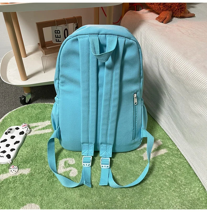Sweet soft girl solid color large capacity student backpack new style for men and women college students simple trendy