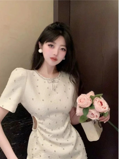 French Temperament Diamond Hollow Out Dress Women Round Neck Bow Bubble Sleeve Slim Summer Chic Korean Lady Gentle Party Wear