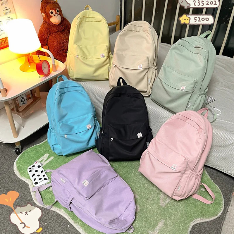 Sweet soft girl solid color large capacity student backpack new style for men and women college students simple trendy