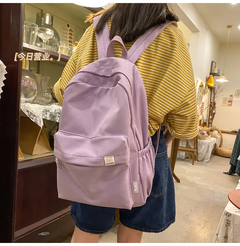 Sweet soft girl solid color large capacity student backpack new style for men and women college students simple trendy