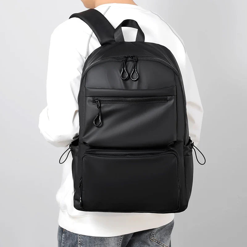 1Pcs 14-inch Fashion Casual Backpack, Spacious Laptop Compartment,Waterproof Fabric,Ideal for Men, Students, and Professionals