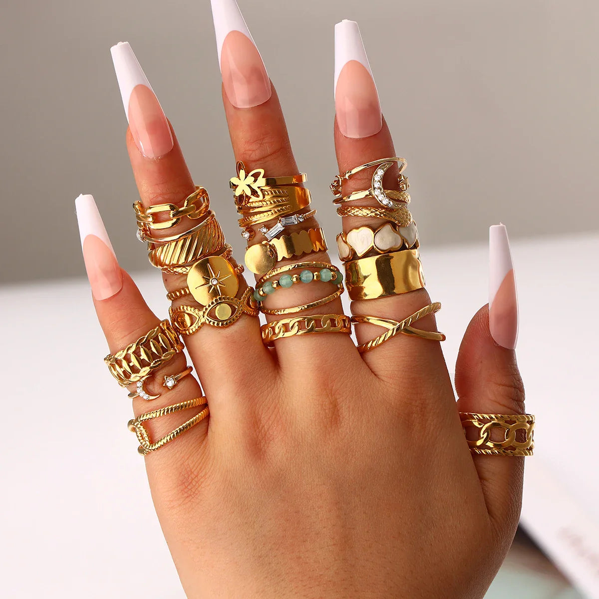 10pcs gold stainless steel women's rings are randomly shipped (without box)