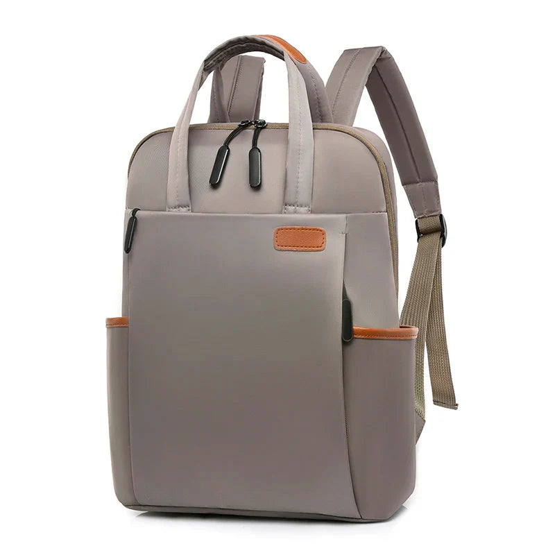 Laptop backpack with multiple pockets, adjustable shoulder straps, zipper closure, multi-purpose, school backpack