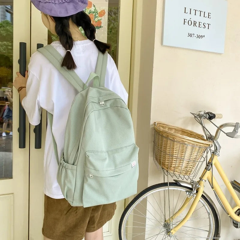 Sweet soft girl solid color large capacity student backpack new style for men and women college students simple trendy