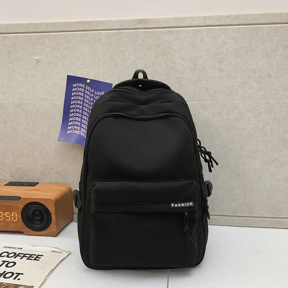 Large Capacity Solid Color Student Backpack Junior and high school simple black travel backpack