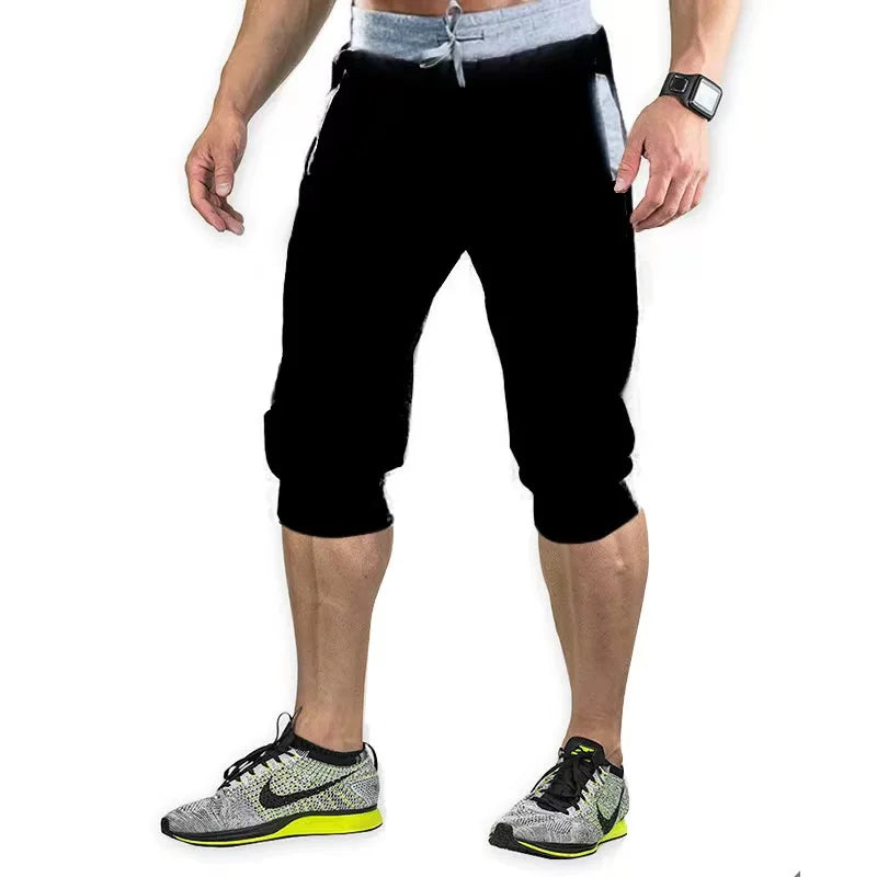 2025 new men's sports pants men's casual jogging shorts elastic fitness pants seven quarter pants casual M-3XL men