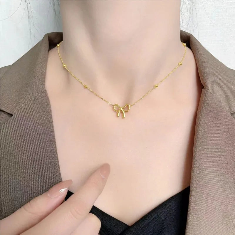 ANENJERY L316 Stainless Steel Beads Chain Hollow Bowknot Pendant Necklace for Women Niche Simple Jewery Accessory