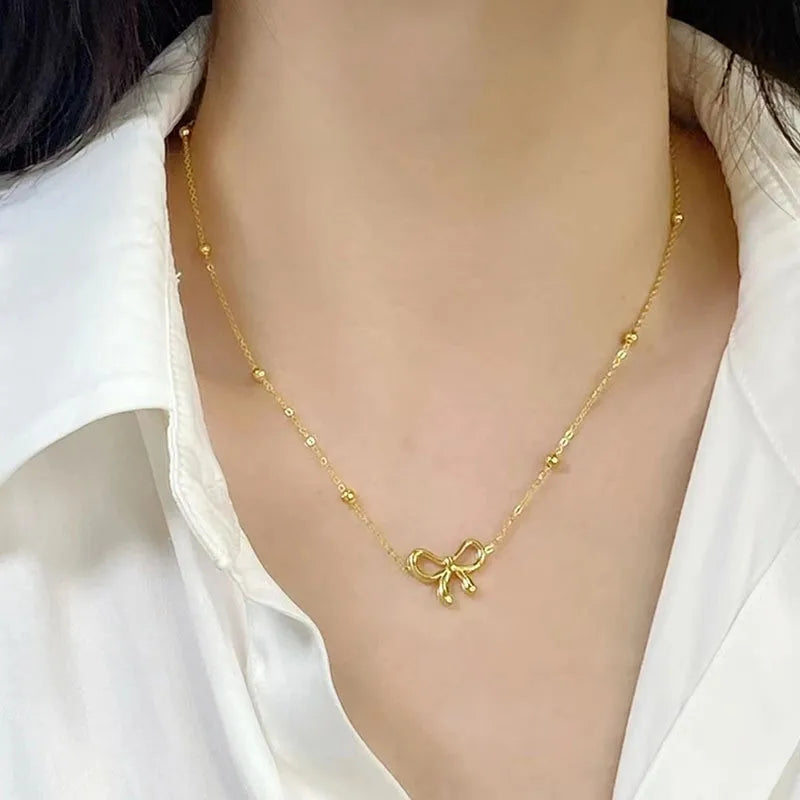 ANENJERY L316 Stainless Steel Beads Chain Hollow Bowknot Pendant Necklace for Women Niche Simple Jewery Accessory
