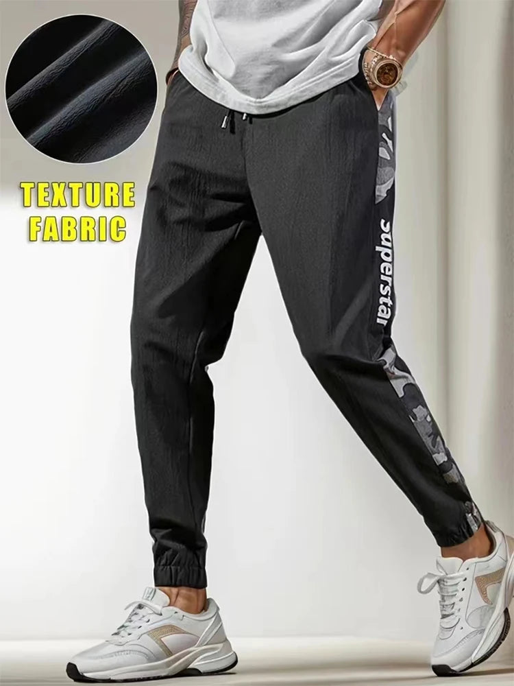 Men's Letter Print Drawstring Sweatpants Camouflage Texture Fabric Breathable Loose Fit