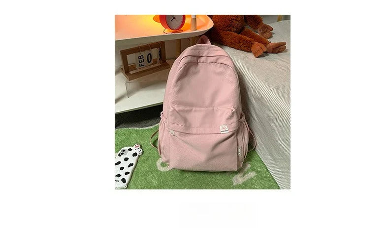 Sweet soft girl solid color large capacity student backpack new style for men and women college students simple trendy