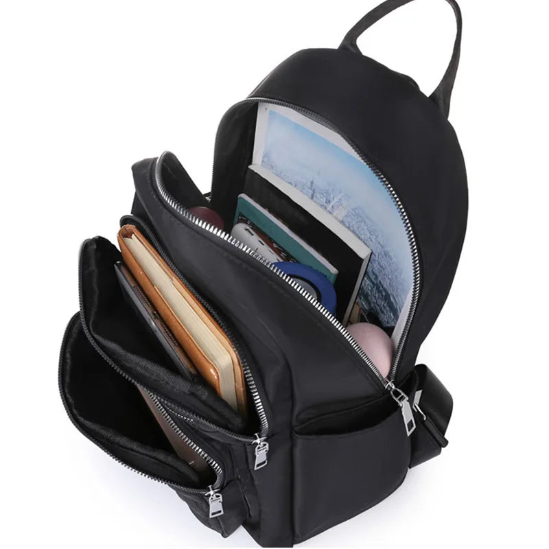 Men's and women's fashionable backpack made of nylon, suitable for travel, tourism and photography. It has multiple pockets.