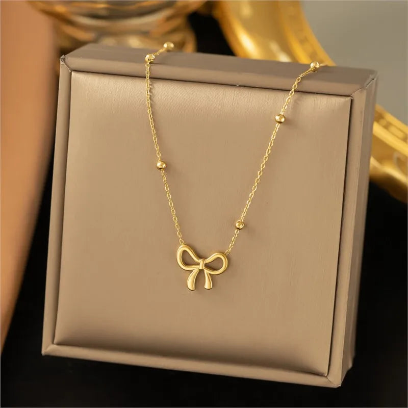 ANENJERY L316 Stainless Steel Beads Chain Hollow Bowknot Pendant Necklace for Women Niche Simple Jewery Accessory