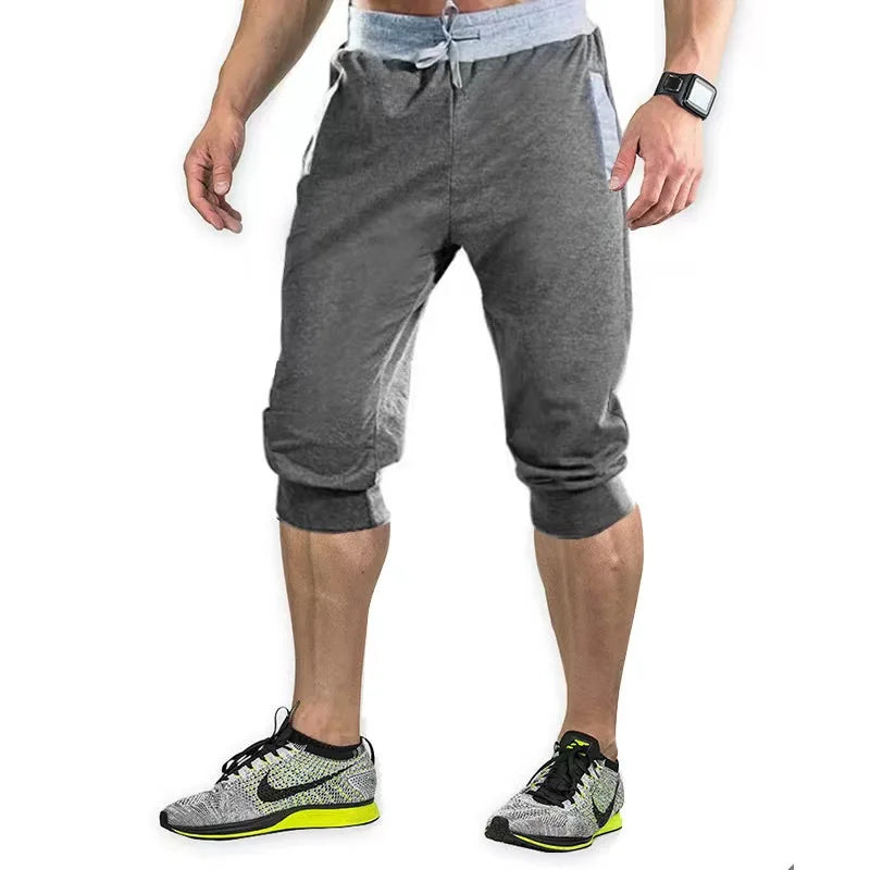 2025 new men's sports pants men's casual jogging shorts elastic fitness pants seven quarter pants casual M-3XL men