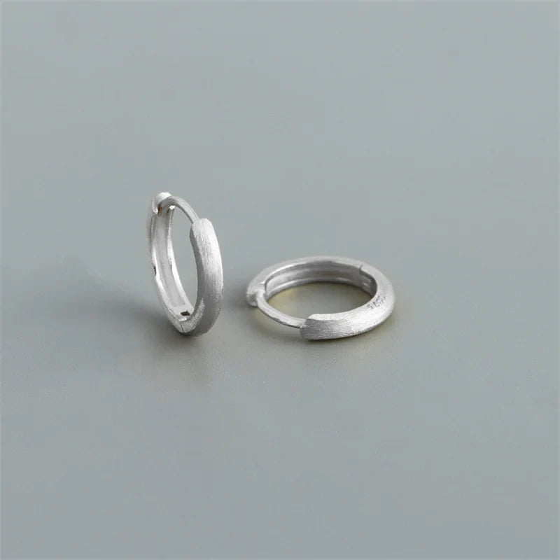 WANTME 925 Sterling Silver Minimalist Matte Gothic Unisex Huggies Ear Hoop Earrings for Women Men Piercing Ear Buckle Jewelry