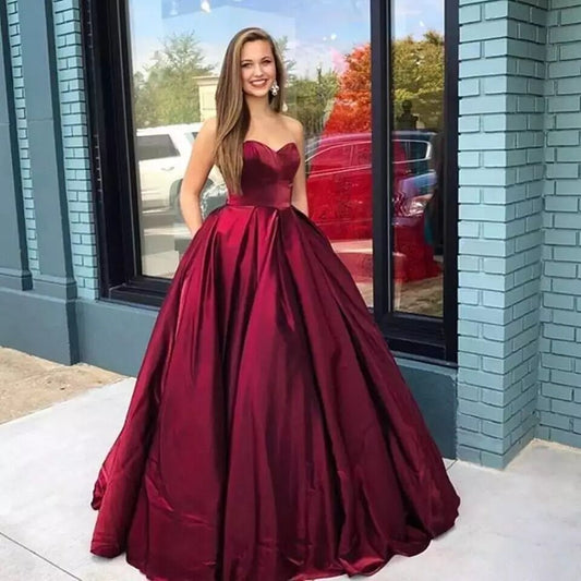 Homecoming Dresses: Burgundy strapless evening prom dresses