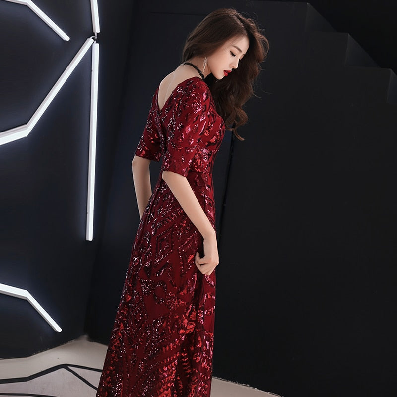 Evening wear Dresses: The Elegant V-neck A-line Half Sleeve Evening Gown