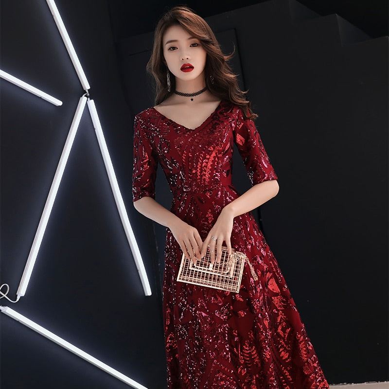 Evening wear Dresses: The Elegant V-neck A-line Half Sleeve Evening Gown